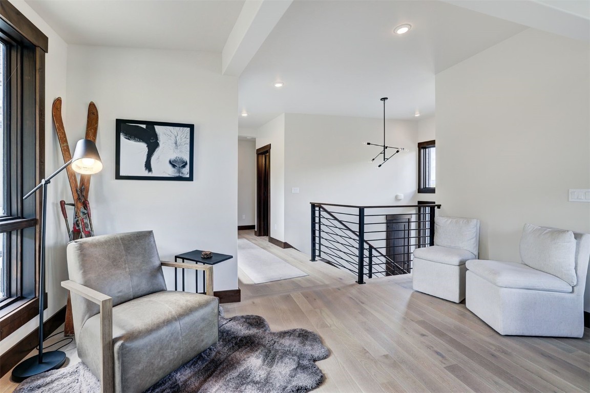 160 Vendette Road Silverthorne, CO 80498 - Photo 21 of 50 Living area with an upstairs landing, light wood finished floors, and recessed lighting