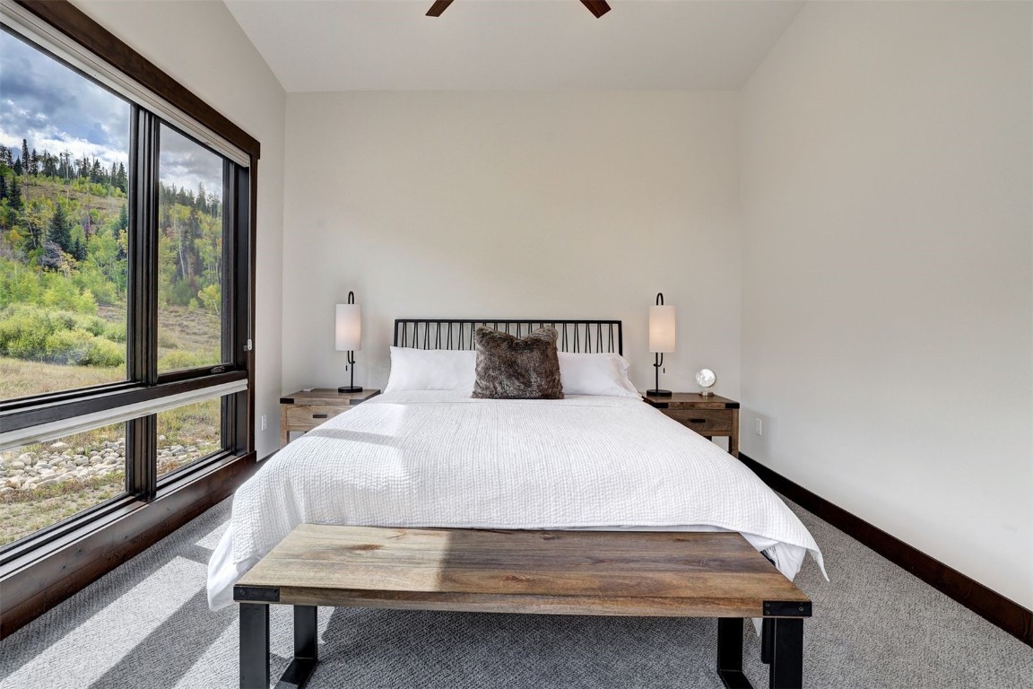 160 Vendette Road Silverthorne, CO 80498 - Photo 22 of 50 Carpeted bedroom featuring baseboards and a ceiling fan