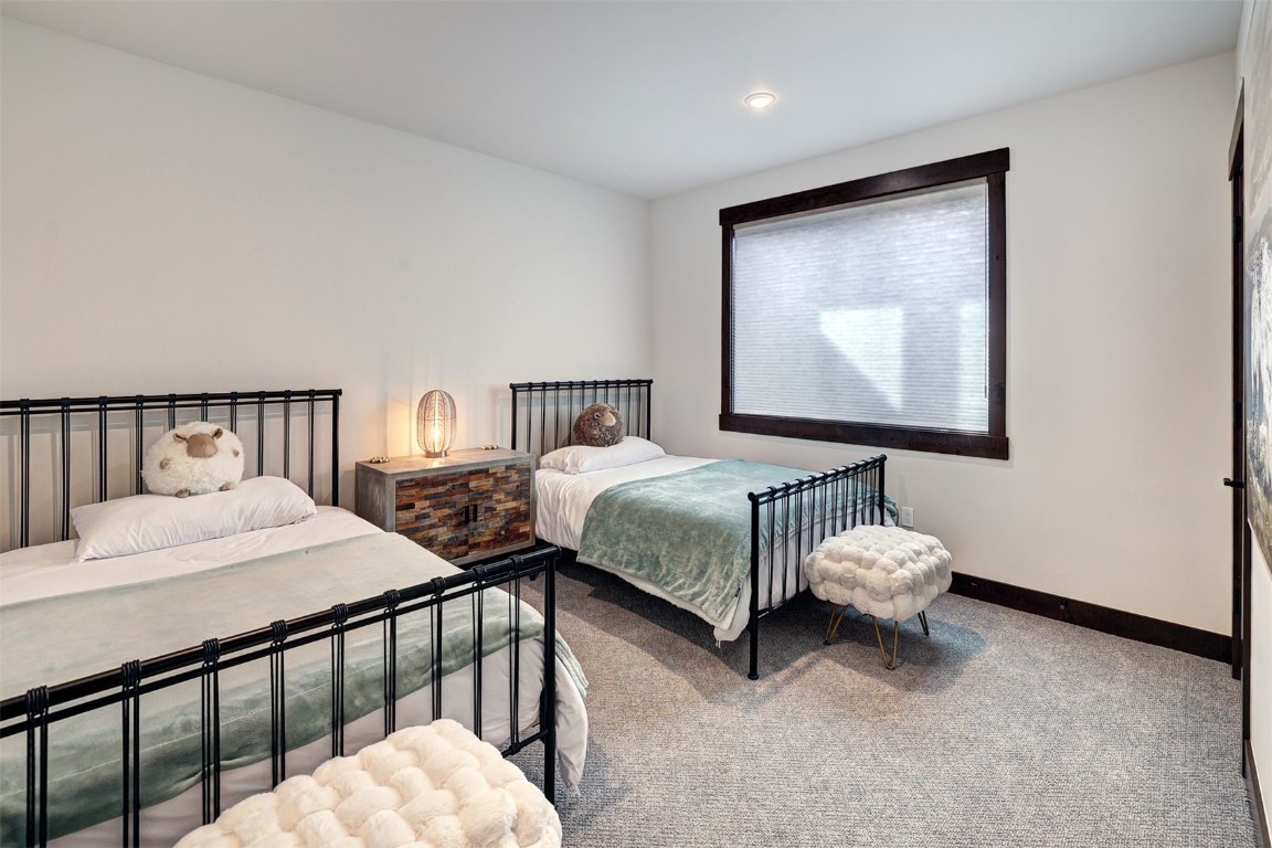 160 Vendette Road Silverthorne, CO 80498 - Photo 32 of 50 Carpeted bedroom featuring baseboards