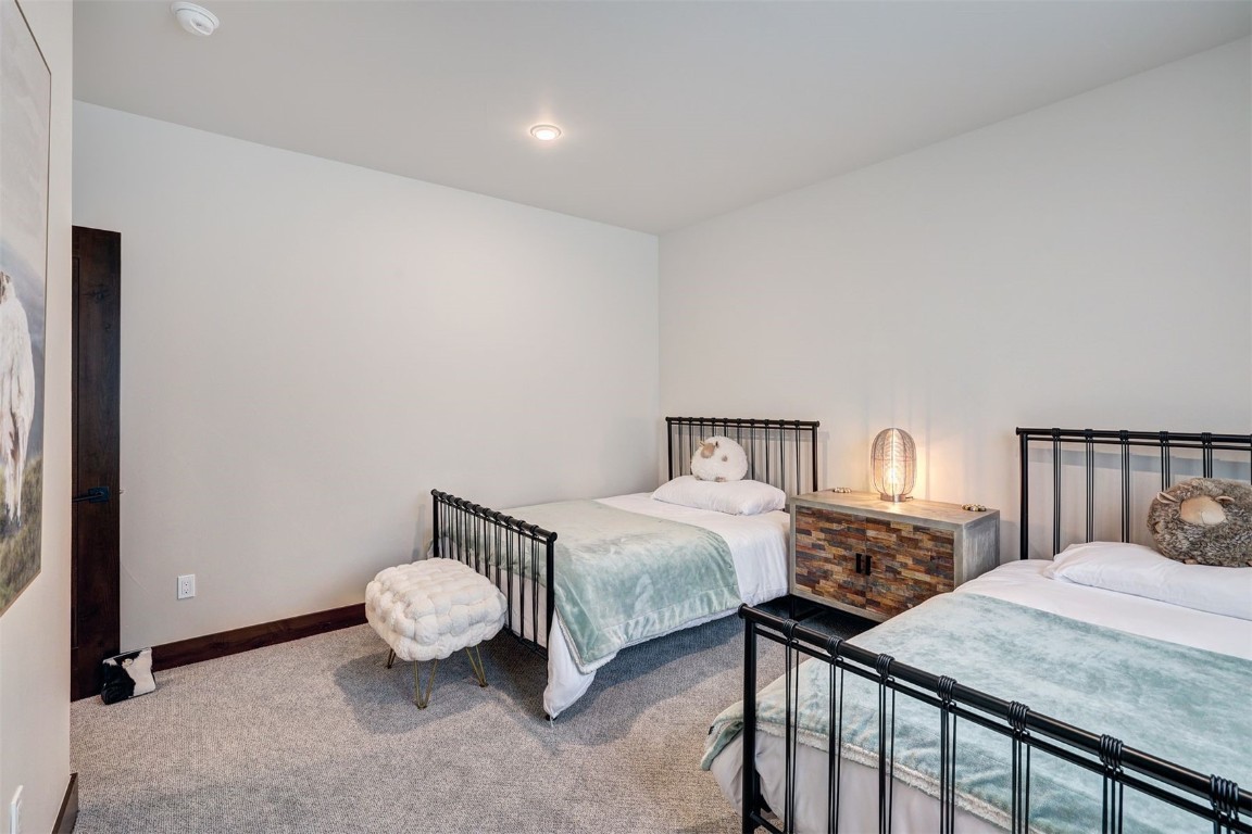 160 Vendette Road Silverthorne, CO 80498 - Photo 34 of 50 Bedroom with carpet and baseboards