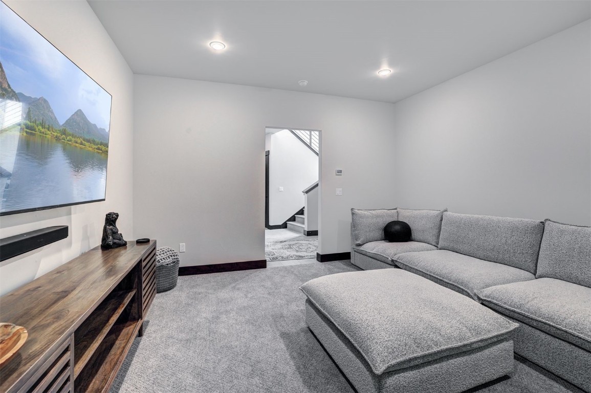 160 Vendette Road Silverthorne, CO 80498 - Photo 35 of 50 Living room with light carpet and recessed lighting