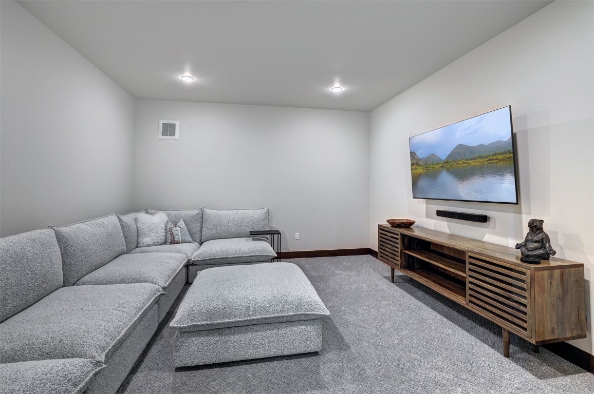 160 Vendette Road Silverthorne, CO 80498 - Photo 36 of 50 Living room featuring carpet floors and recessed lighting