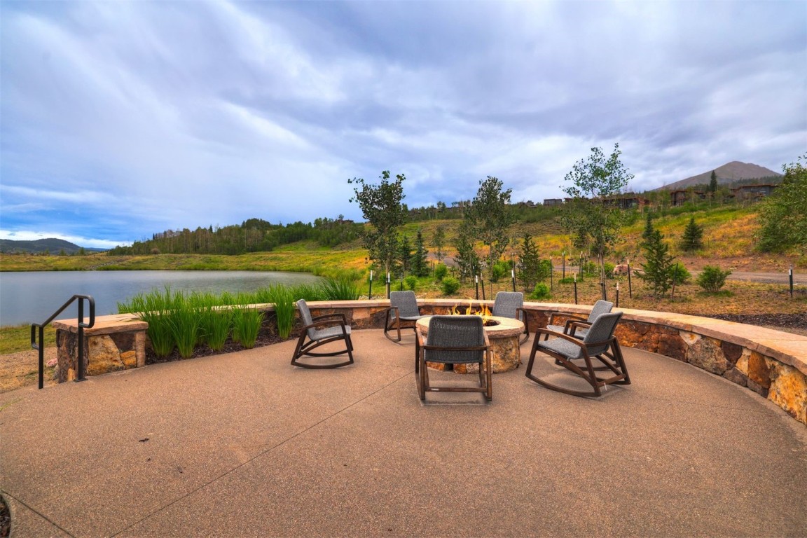 160 Vendette Road Silverthorne, CO 80498 - Photo 48 of 50 View of patio featuring a fire pit and a water view