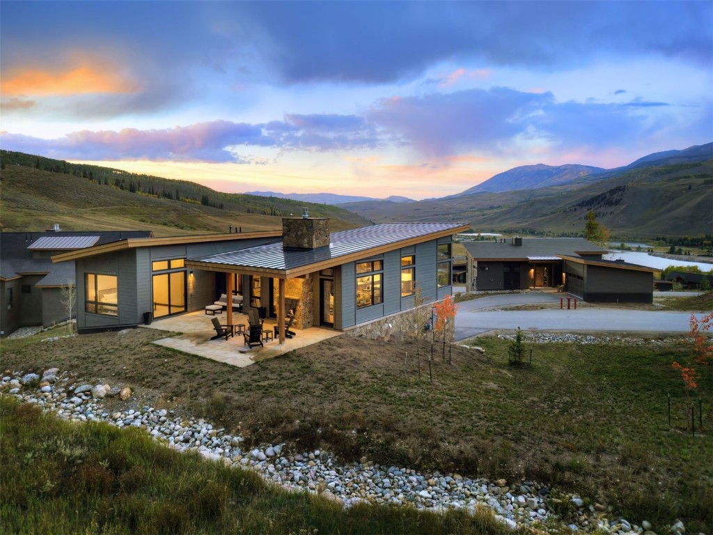 160 Vendette Road Silverthorne, CO 80498 - Photo 7 of 50 Rear view of property with a patio, a chimney, and a mountain view