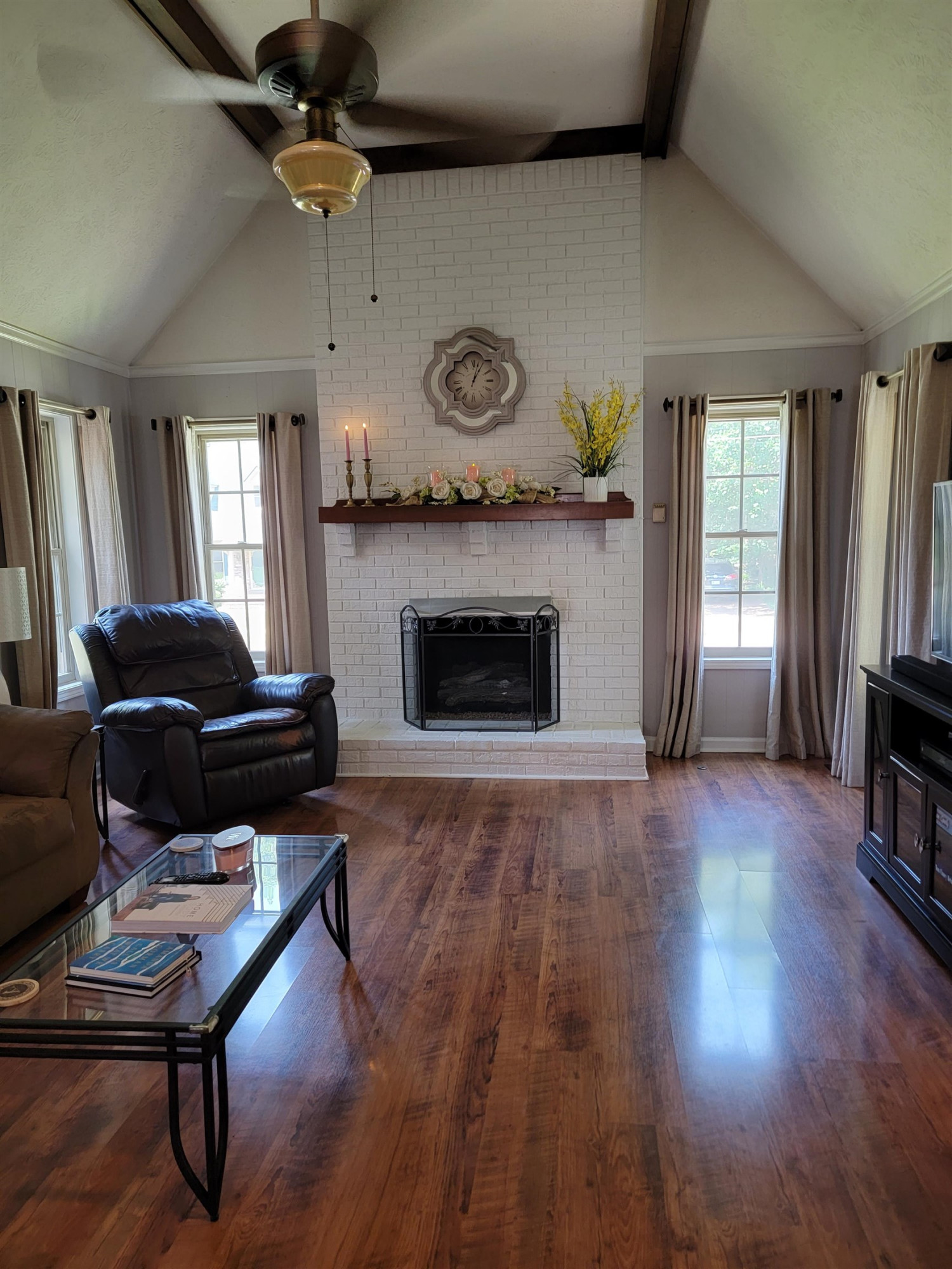 48 Windy Hill Road Jackson, TN 38305 - Photo 8 of 20 a living room with furniture and a fireplace
