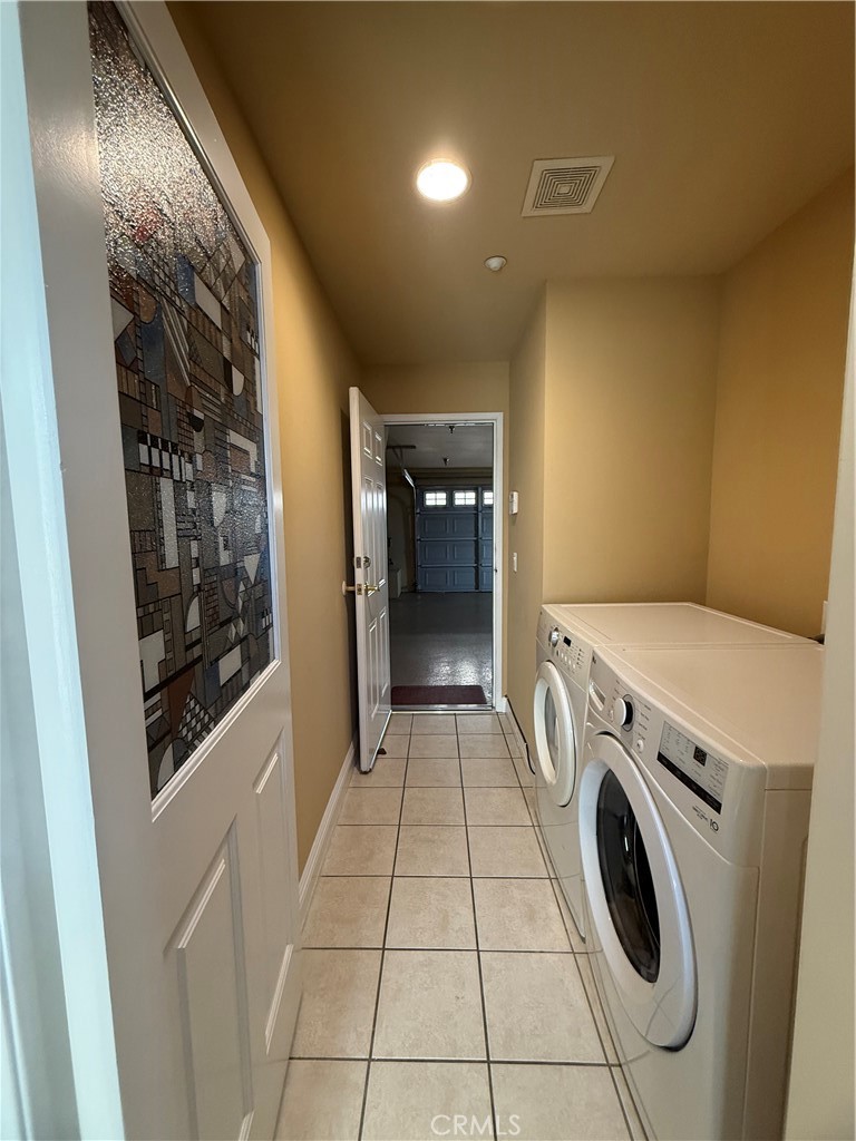 57 Alice Street, Unit A Arcadia, CA 91006 - Photo 26 of 34 a view of washer and dryer with bathroom in the background