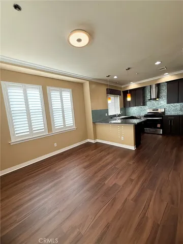 a bathroom with a toilet a sink and shower