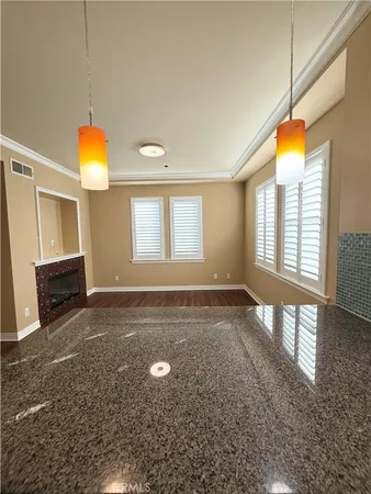 a view of kitchen with wooden floor