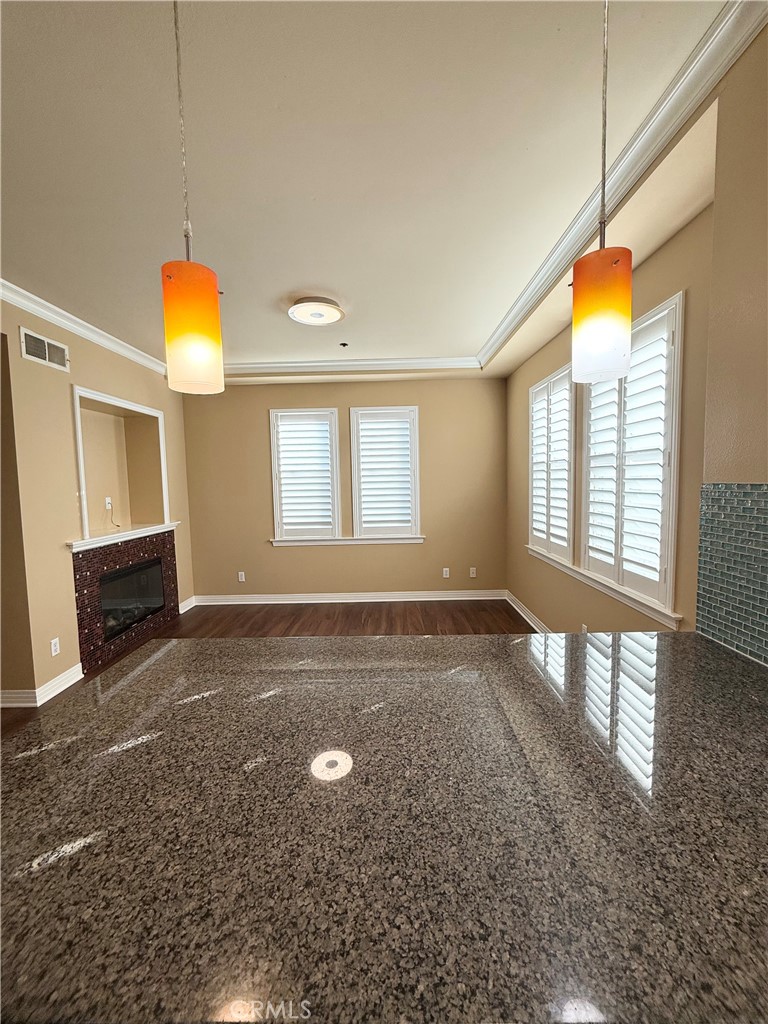 57 Alice Street, Unit A Arcadia, CA 91006 - Photo 8 of 34 a view of an empty room with window and chandelier fan