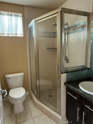 a view of a balcony with furniture