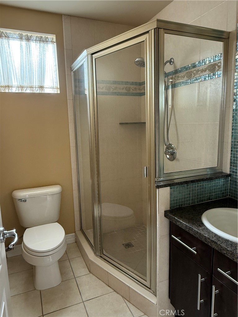 57 Alice Street, Unit A Arcadia, CA 91006 - Photo 10 of 34 a bathroom with a toilet a sink and shower