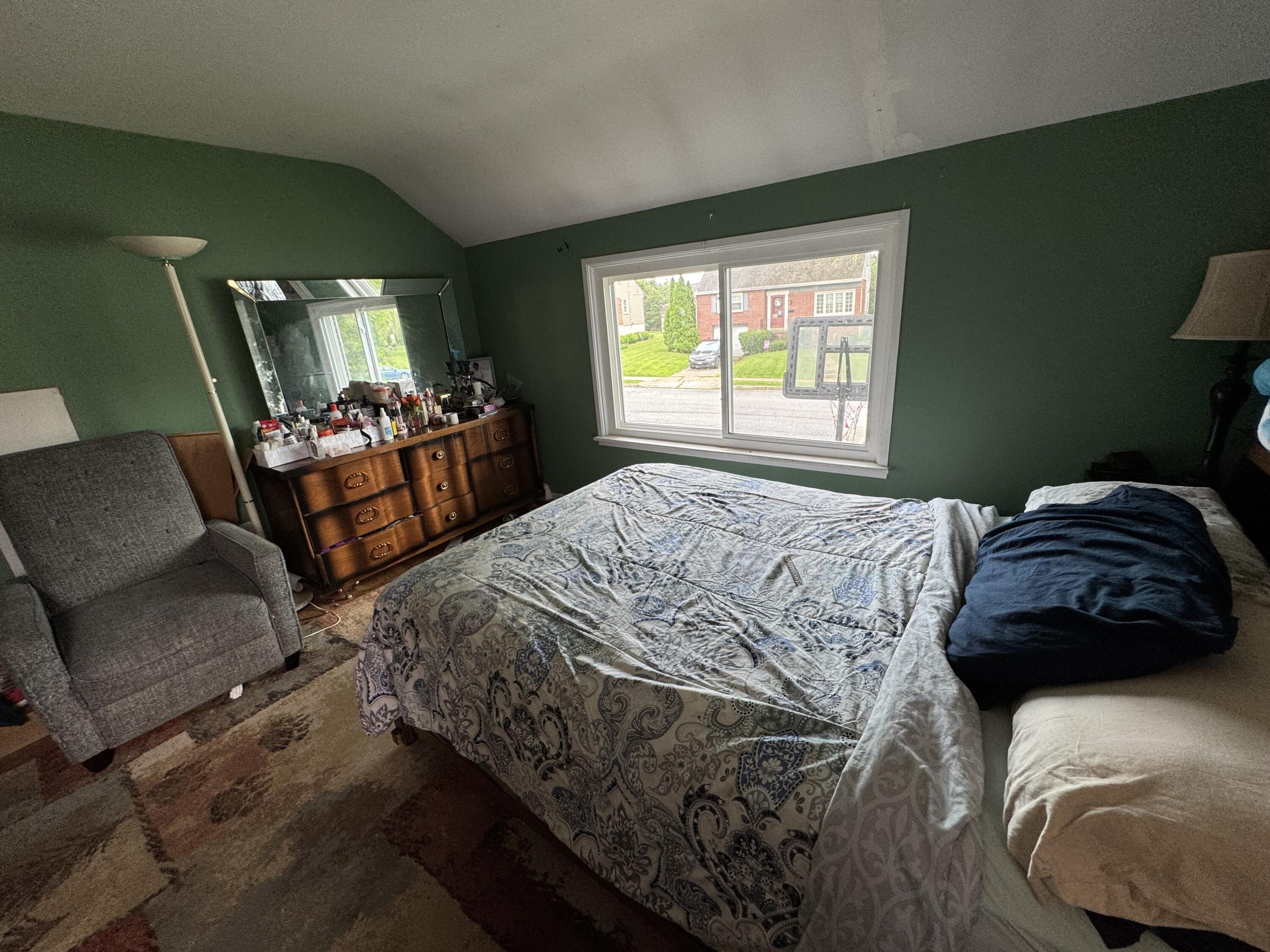 511 Grill Avenue Reading, PA 19607 - Photo 21 of 30 a bedroom with a bed and a couch