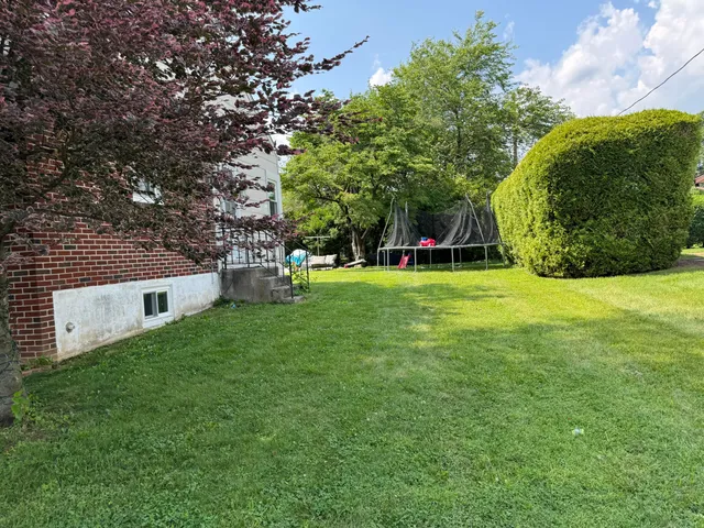 a bathroom with a sink a mirror and vanity