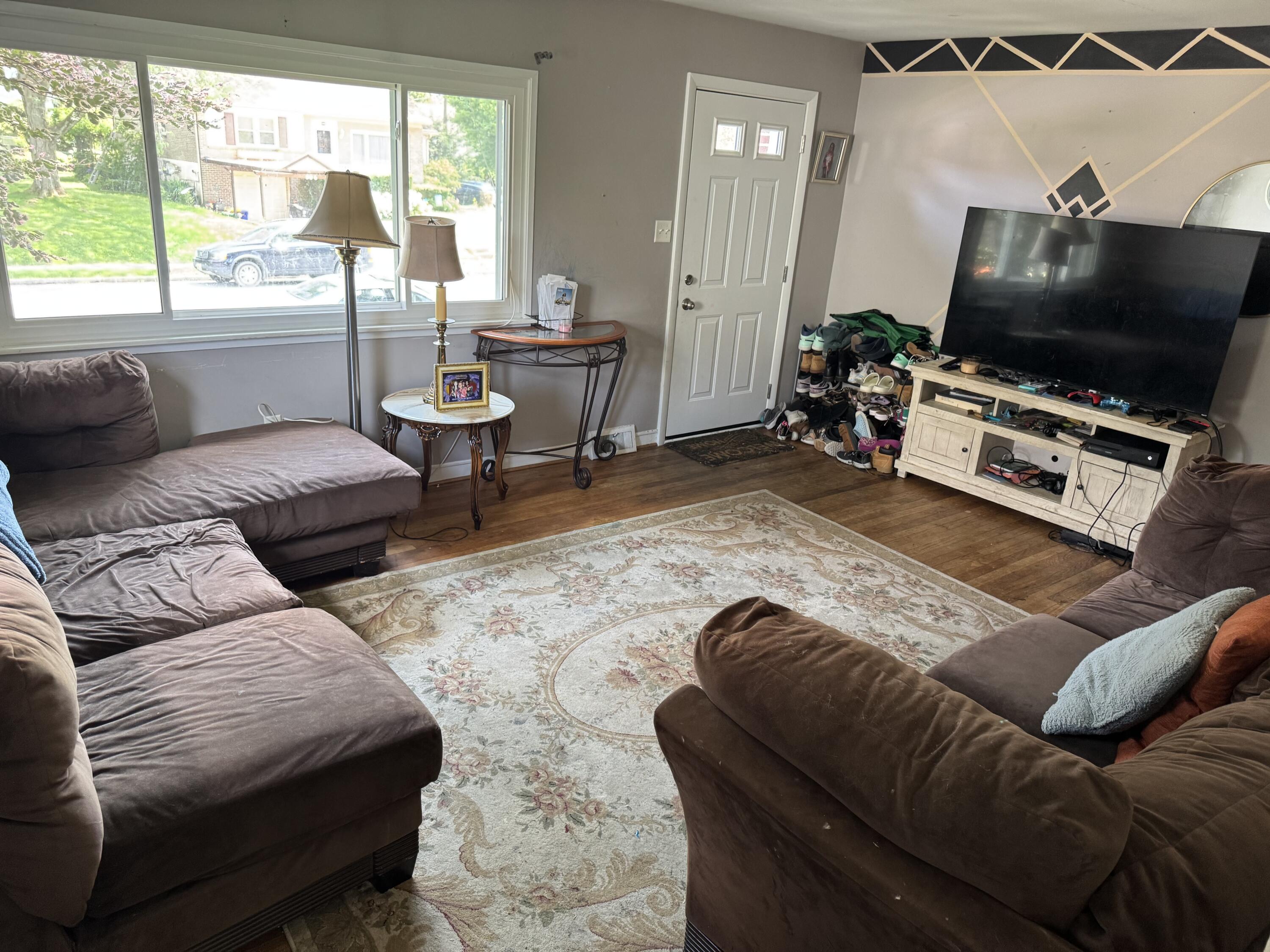 511 Grill Avenue Reading, PA 19607 - Photo 8 of 30 a living room with furniture and a flat screen tv