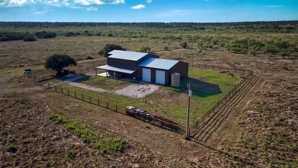 a view of a pathway with a yard