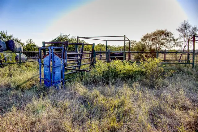 a view of a lake with houses in the back