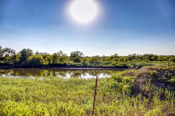 a view of lake with and houses