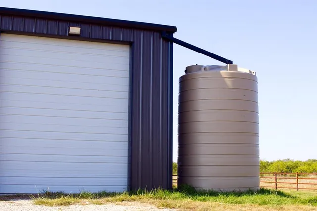 a view of swimming pool with a lounge chairs