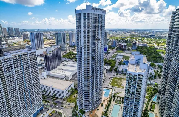a view of a city with tall buildings