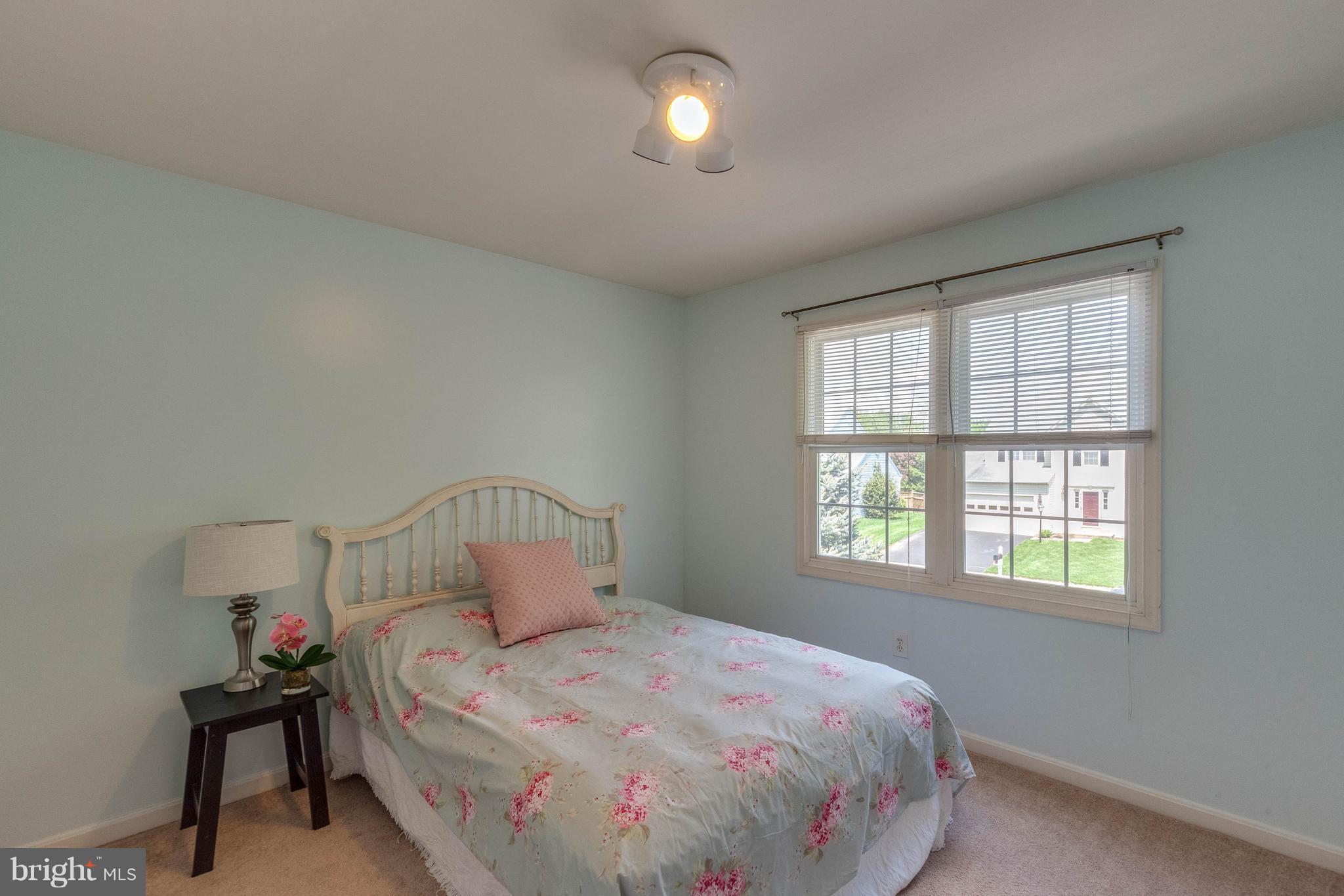 1746 Canal Run Drive Point of Rocks, MD 21777 - Photo 13 of 30 a bedroom with a bed and window