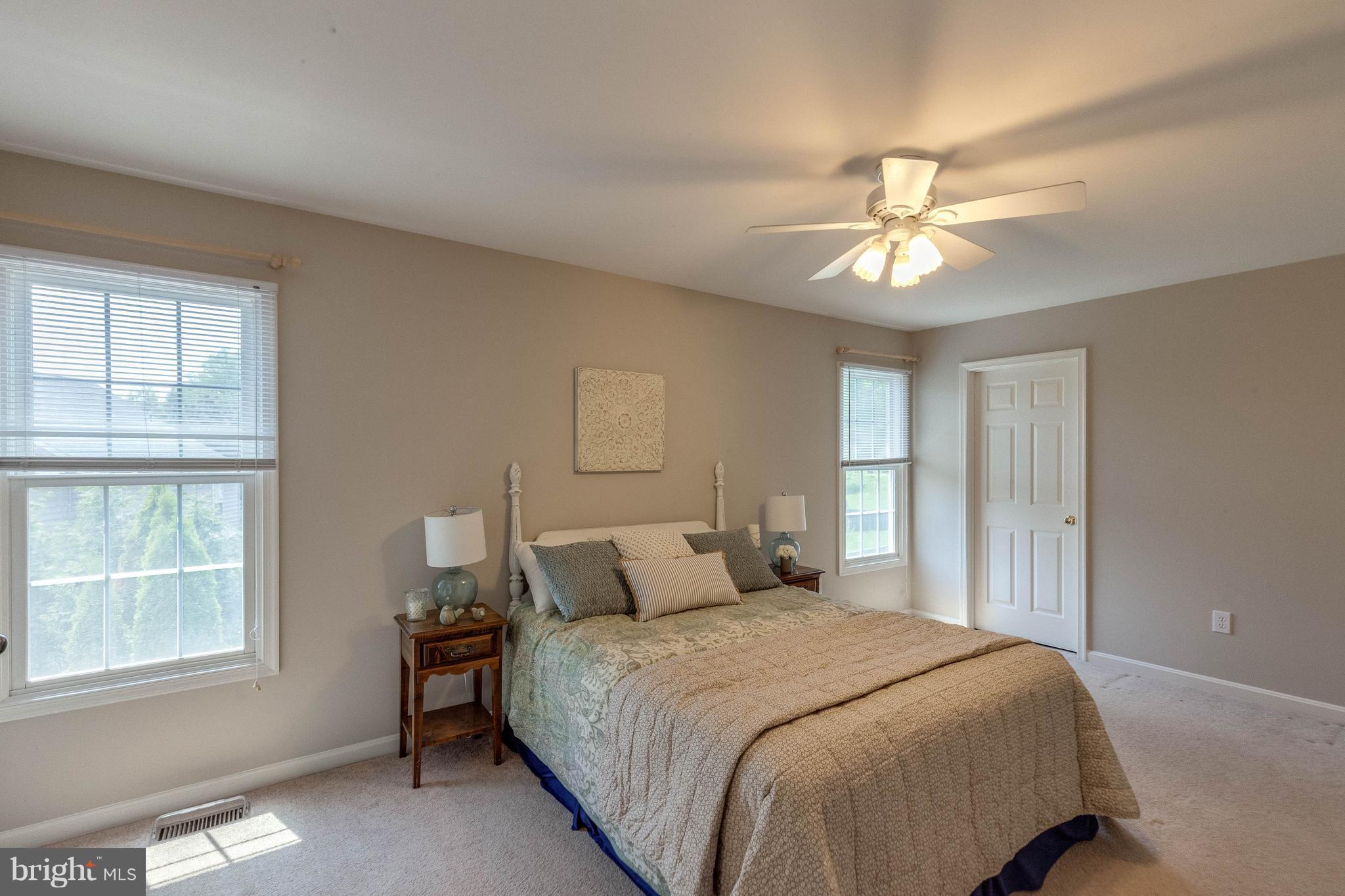 1746 Canal Run Drive Point of Rocks, MD 21777 - Photo 16 of 30 a bedroom with a large bed and a window