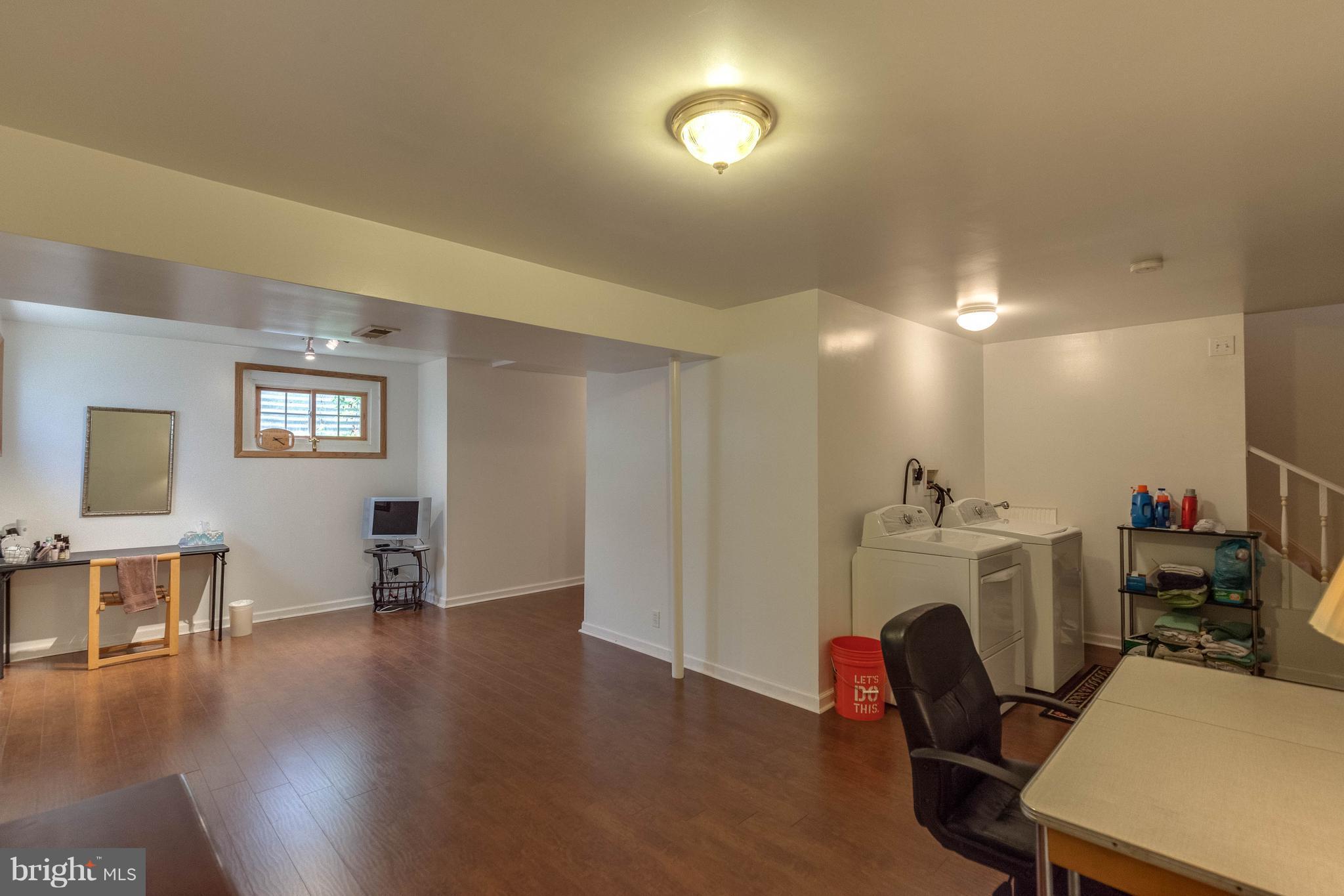 1746 Canal Run Drive Point of Rocks, MD 21777 - Photo 23 of 30 a view of a workspace with furniture and wooden floor