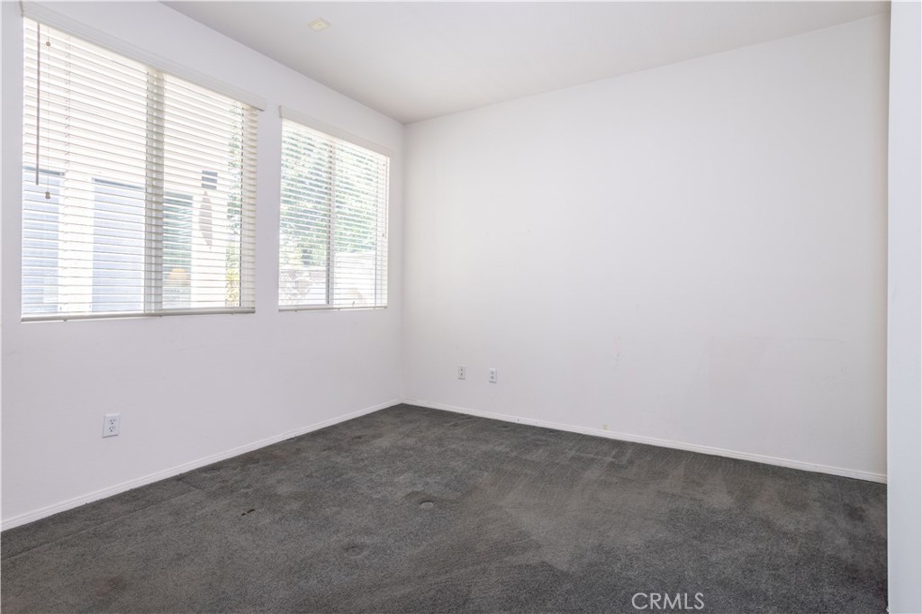 11480 Autumn Glen Court Porter Ranch, CA 91326 - Photo 20 of 38 an empty room with a window