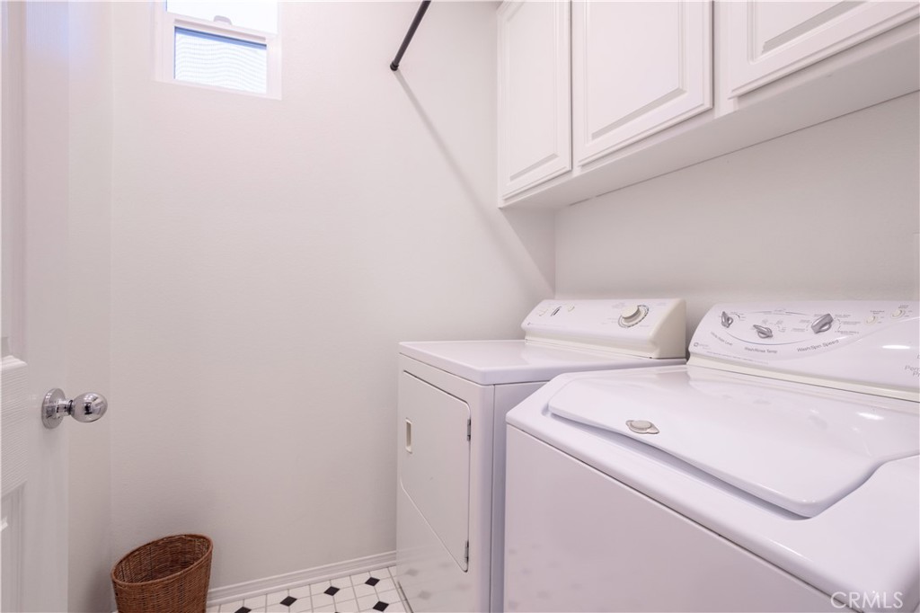 11480 Autumn Glen Court Porter Ranch, CA 91326 - Photo 25 of 38 a utility room with dryer and washer