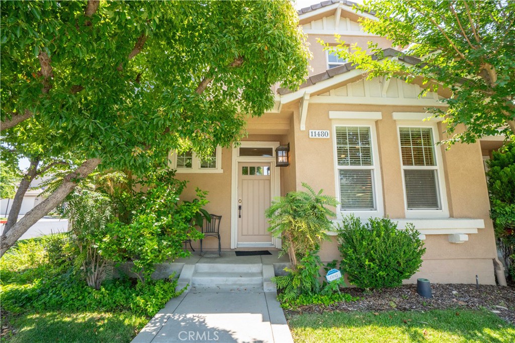 11480 Autumn Glen Court Porter Ranch, CA 91326 - Photo 37 of 38 a front view of a house with a yard