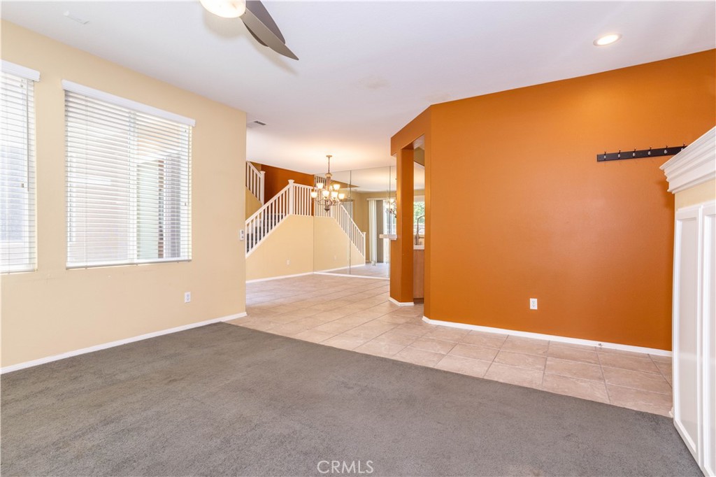 11480 Autumn Glen Court Porter Ranch, CA 91326 - Photo 9 of 38 a view of a livingroom with a staircase