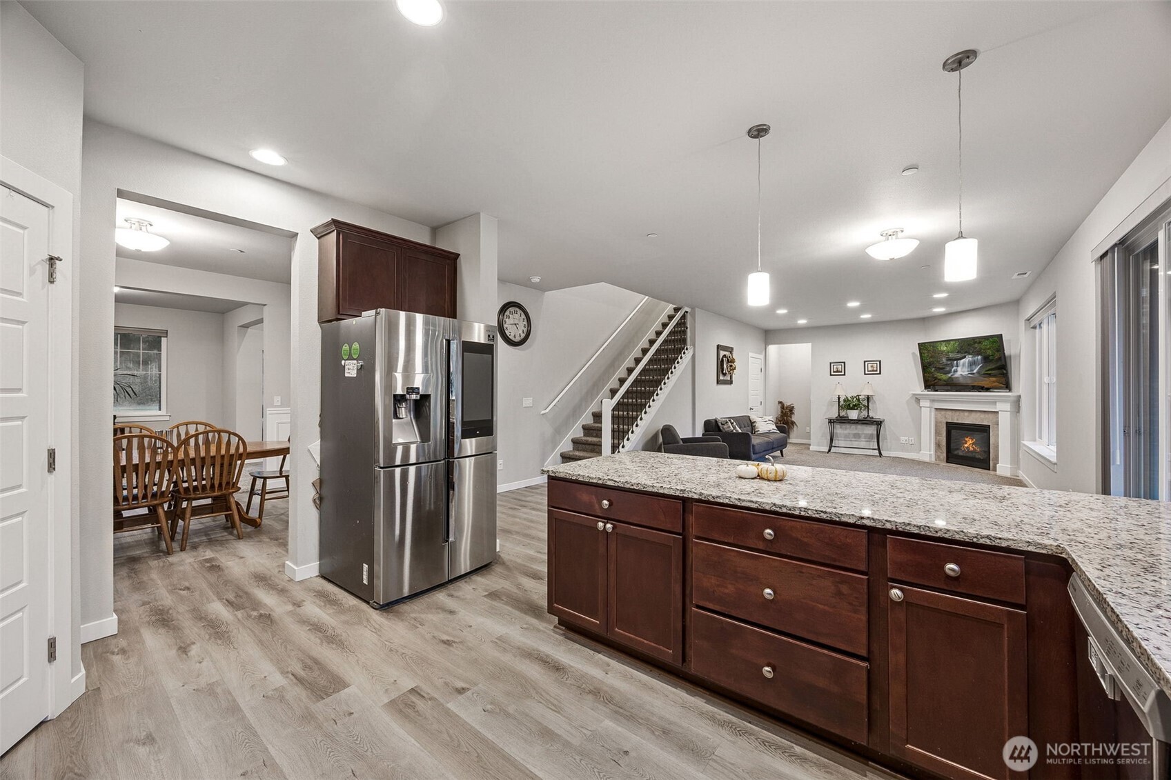 12016 264th Street East Graham, WA 98338 - Photo 12 of 40 a spacious bathroom with a granite countertop sink and a mirror