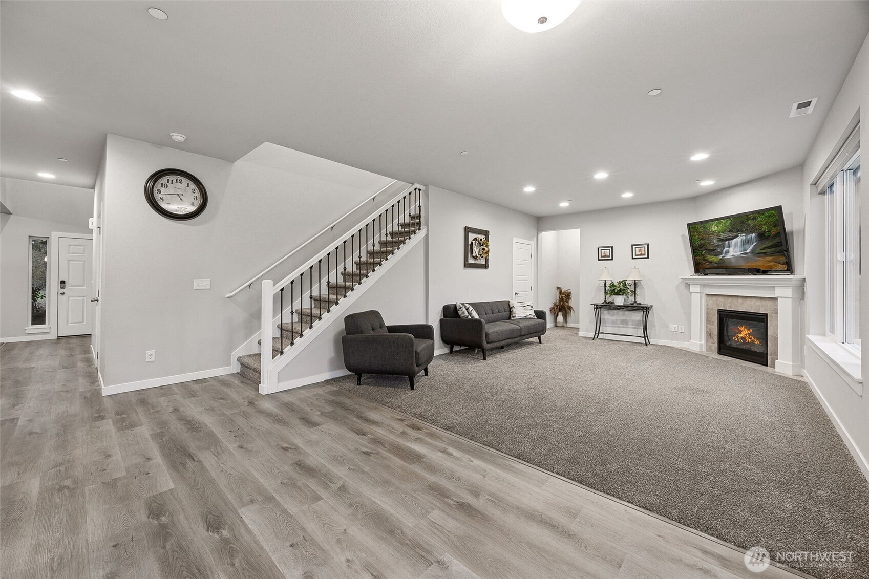 12016 264th Street East Graham, WA 98338 - Photo 13 of 40 a living room with furniture and a fireplace