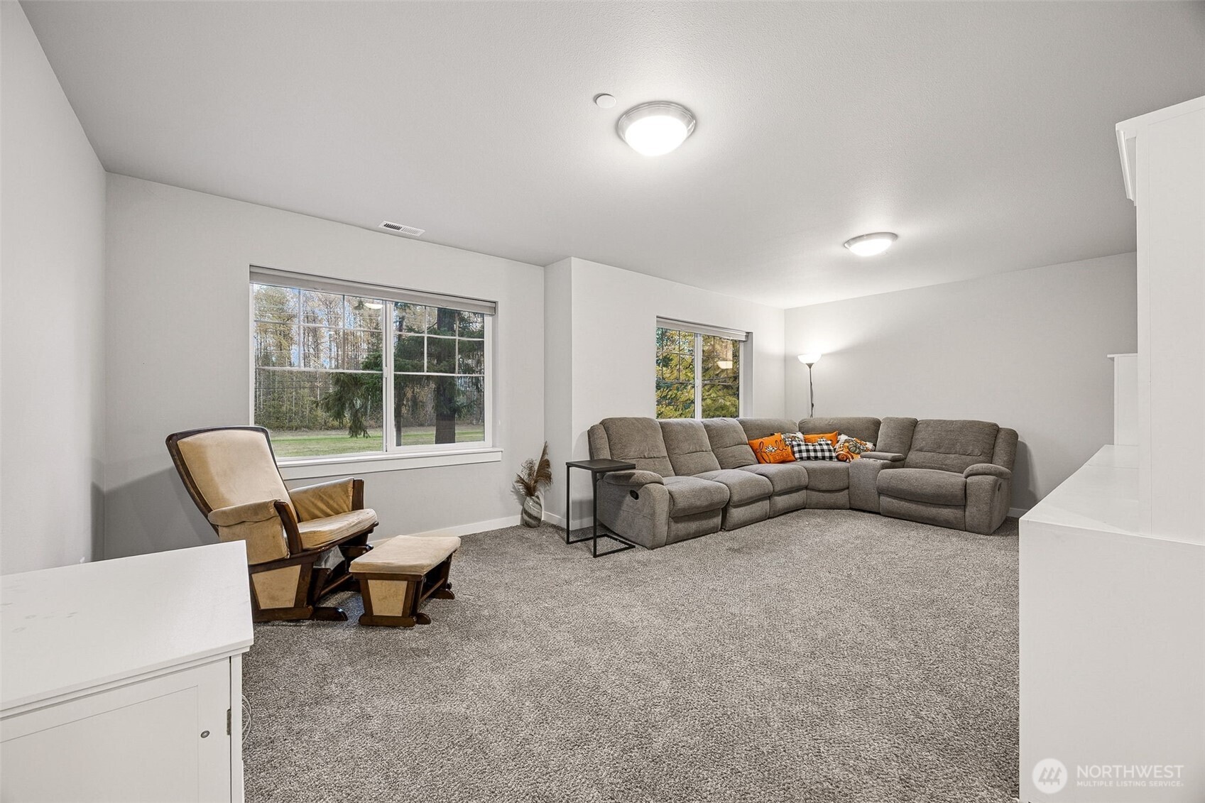 12016 264th Street East Graham, WA 98338 - Photo 24 of 40 a living room with furniture and a large window