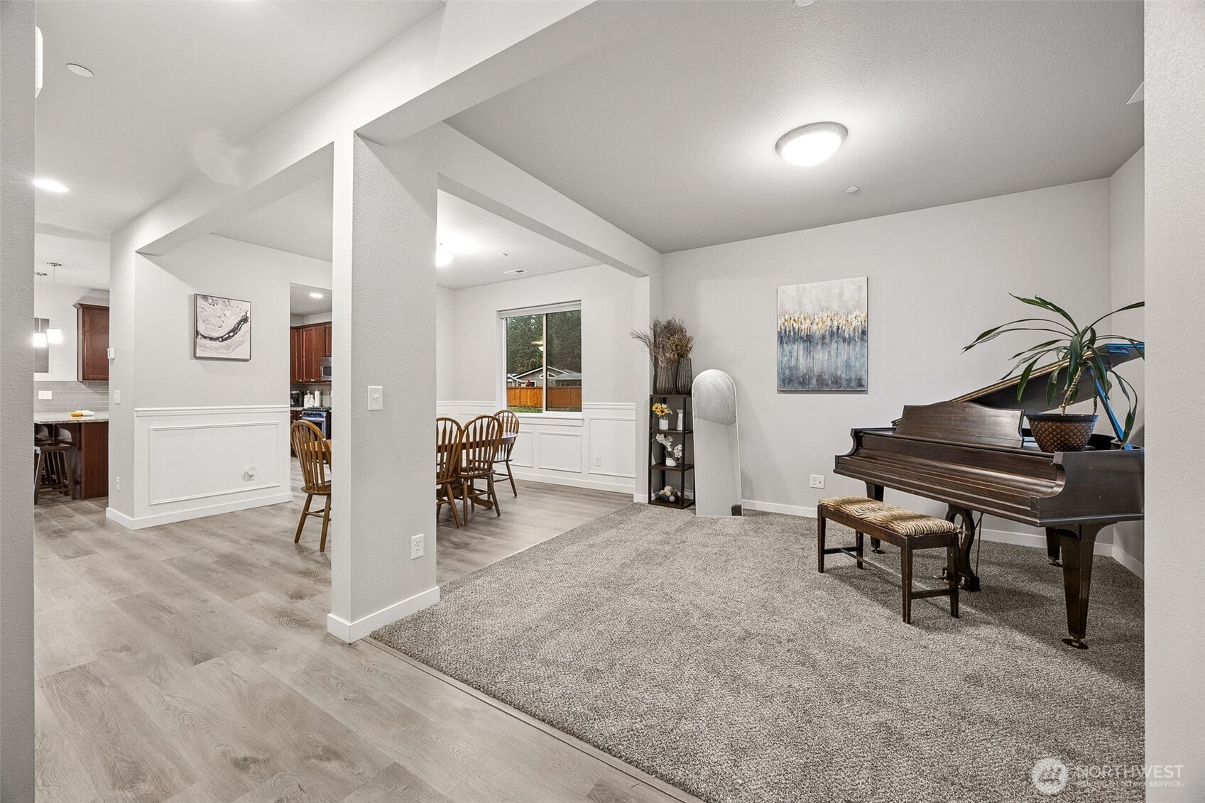 12016 264th Street East Graham, WA 98338 - Photo 3 of 40 a living room with furniture and a wooden floor