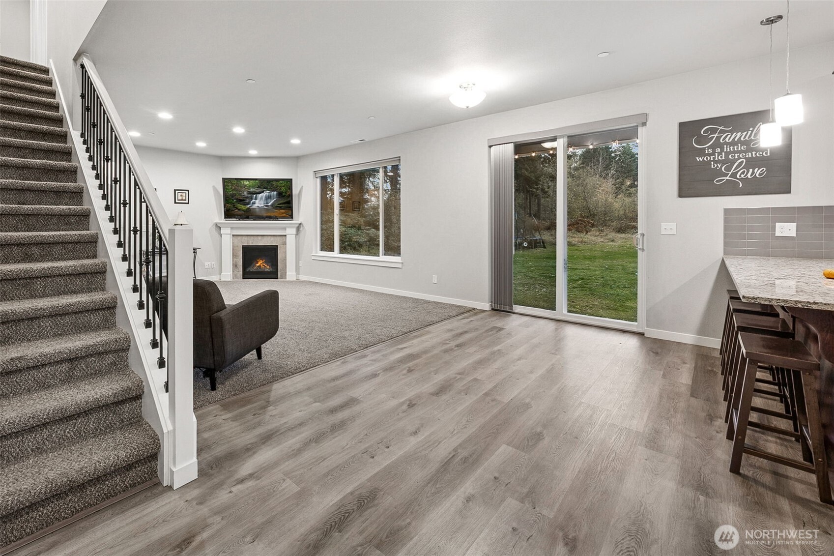 12016 264th Street East Graham, WA 98338 - Photo 6 of 40 a view of a livingroom with furniture and staircase
