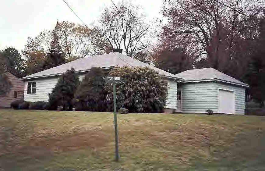 162 Bull Hill Road Lanesborough, MA 01237 - Photo 1 of 1 a backyard of a house with palm trees