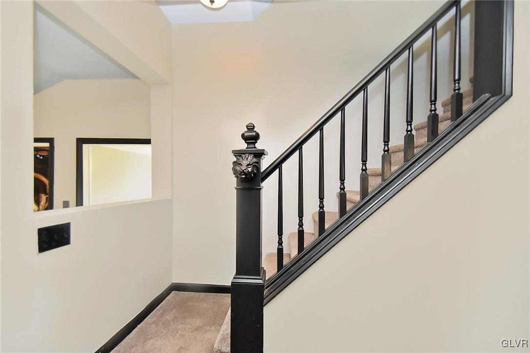 389 Meyer Road Nazareth, PA 18064 - Photo 17 of 50 a view of staircase with lots of frames on wall and a window