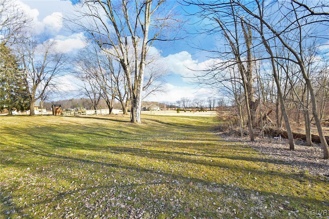 389 Meyer Road Nazareth, PA 18064 - Photo 8 of 50 a view of a yard with an trees