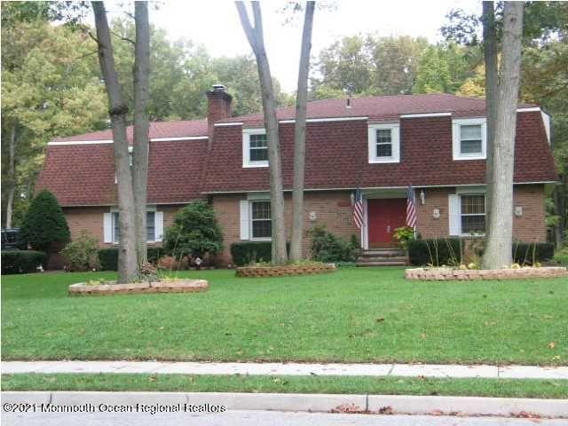 523 South Cooks Bridge Road Jackson, NJ 08527 - Photo 2 of 4 a front view of a house with a yard