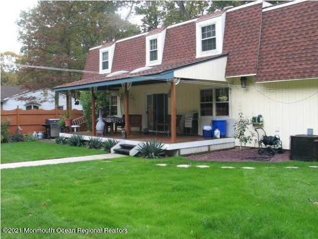523 South Cooks Bridge Road Jackson, NJ 08527 - Photo 3 of 4 a view of a house with a yard porch and sitting area