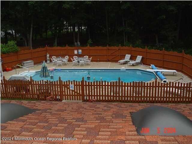 523 South Cooks Bridge Road Jackson, NJ 08527 - Photo 4 of 4 a view of a backyard with a deck
