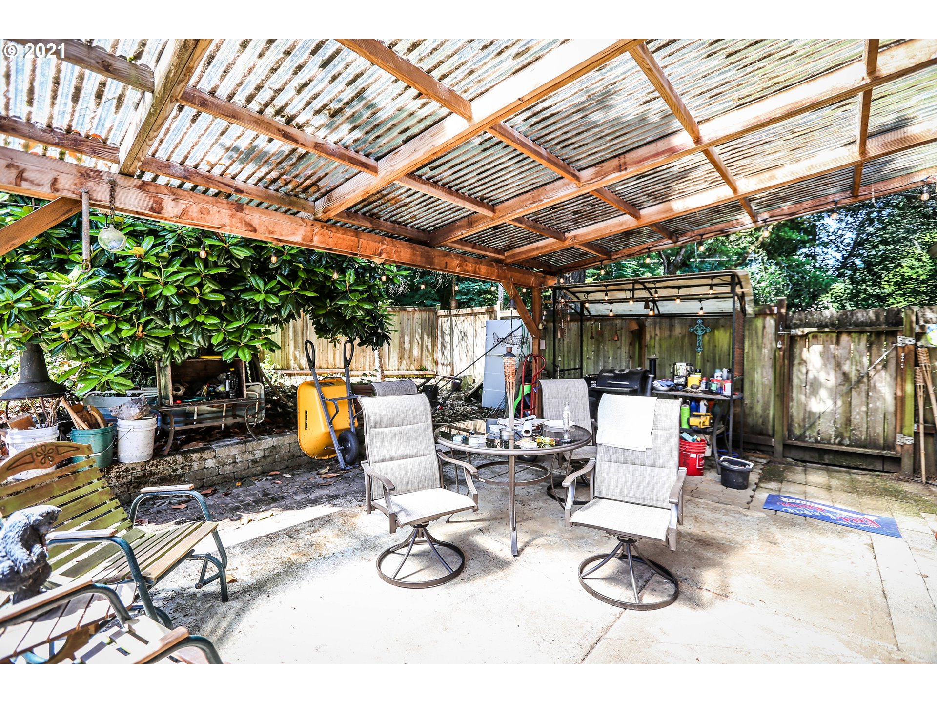 3890 Hayden Bridge Road Springfield, OR 97477 - Photo 18 of 19 a outdoor living space with furniture and a grill