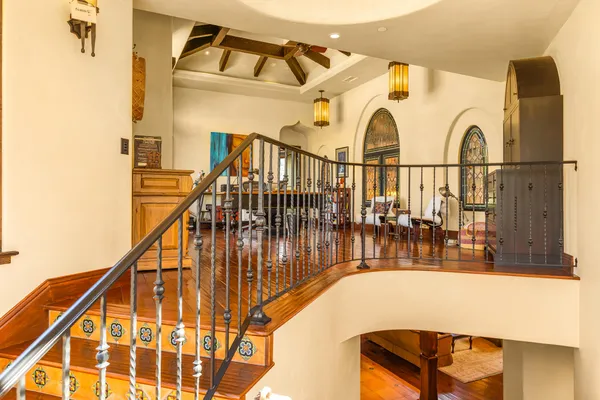 a view of balcony with furniture