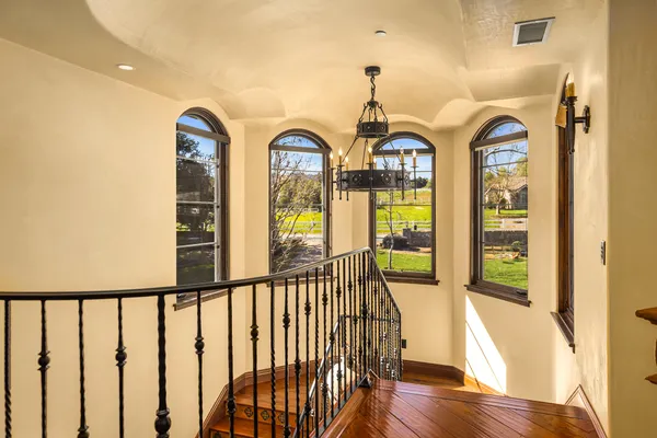 a view of two windows in a balcony