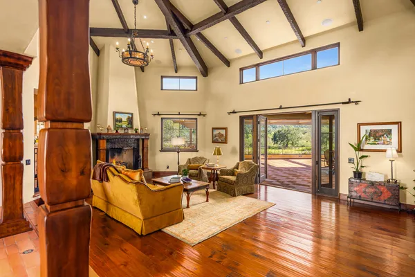a living room with furniture and a table