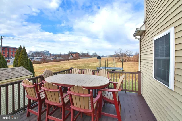 a view of a lake with houses in the back
