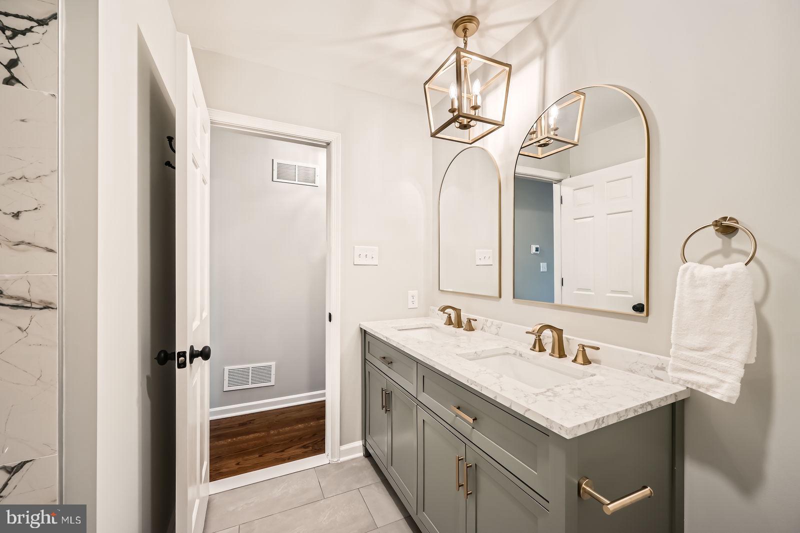 2701 Beckleysville Road Manchester, MD 21102 - Photo 21 of 39 a bathroom with a sink and a mirror