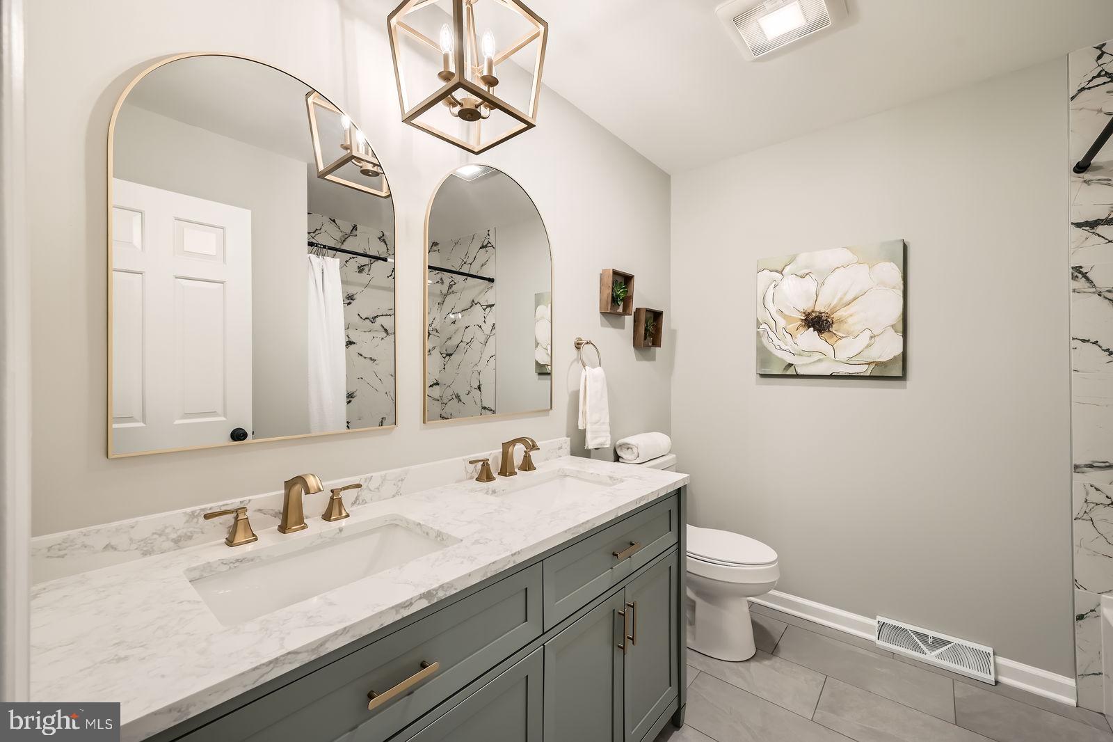 2701 Beckleysville Road Manchester, MD 21102 - Photo 22 of 39 a bathroom with a granite countertop sink mirror and toilet