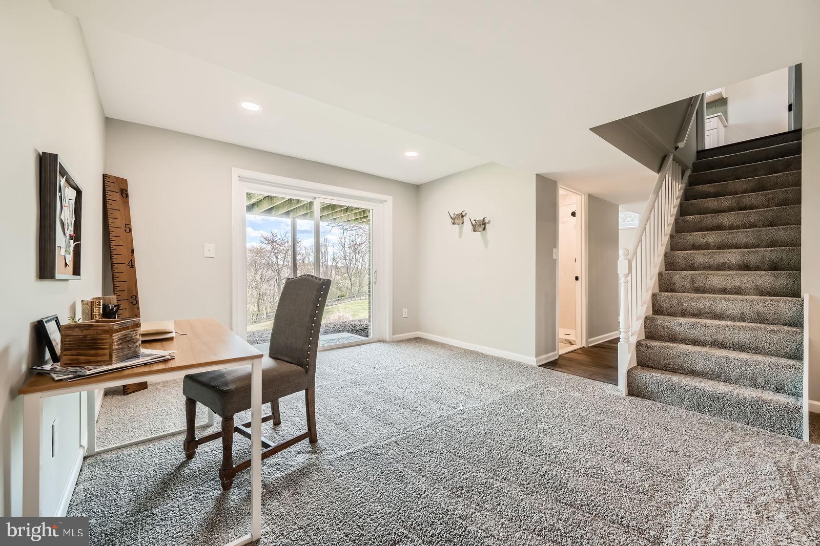 2701 Beckleysville Road Manchester, MD 21102 - Photo 29 of 39 a workspace with furniture and stairs