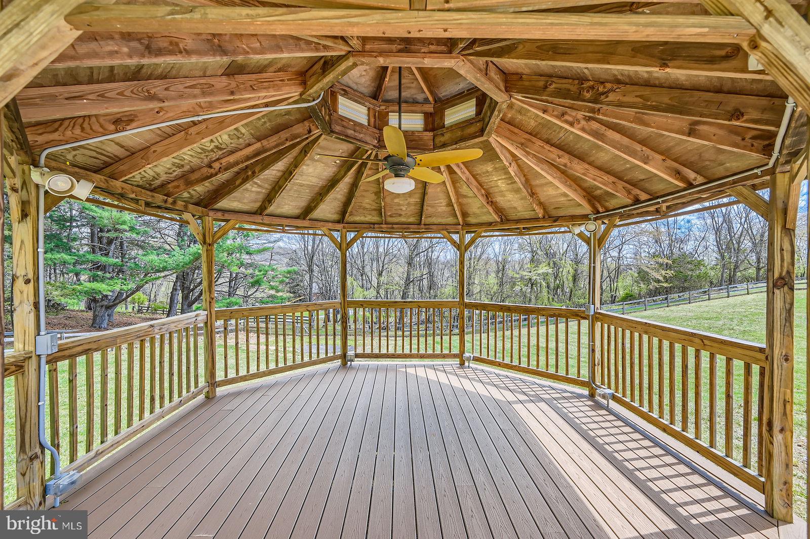 2701 Beckleysville Road Manchester, MD 21102 - Photo 35 of 39 a view of a wooden deck with a backyard